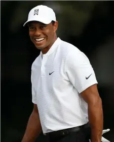 ?? Getty ImaGes ?? DEFENDING CHAMP: Tiger Woods will finally get to defend his 2019 Masters win this weekend.