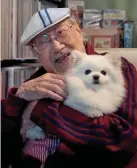  ?? AP ?? Ray Cordeiro, Hong Kong’s oldest DJ, with his dog in Hong Kong.