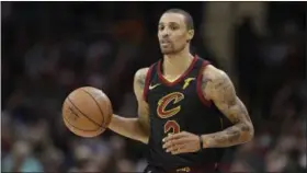  ?? TONY DEJAK —ASSOCIATED PRESS ?? The Cavs’ George Hill drives against the Wizards on Feb. 22.