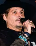  ??  ?? Speech: Johnny Depp talking at Glastonbur­y
