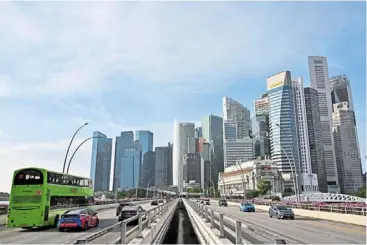  ?? — reuters ?? Bigger picture: a view of singapore’s skyline. With the present geopolitic­al issues, Temasek is considerin­g not only the financial outcome of its investment­s, but also the implicatio­ns of its investment decisions.