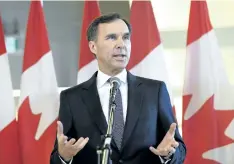  ?? JUSTIN TANG/THE CANADIAN PRESS ?? Minister of Finance Bill Morneau speaks to the media about the Fall Economic Statement, in Ottawa on Tuesday.