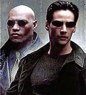  ??  ?? Surreal: Laurence Fishburne and Keanu Reeves in The Matrix