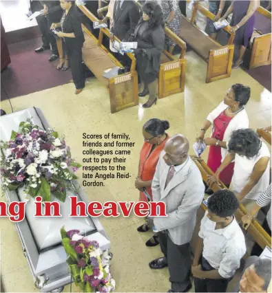  ??  ?? Scores of family, friends and former colleagues came out to pay their respects to the late Angela Reidgordon.