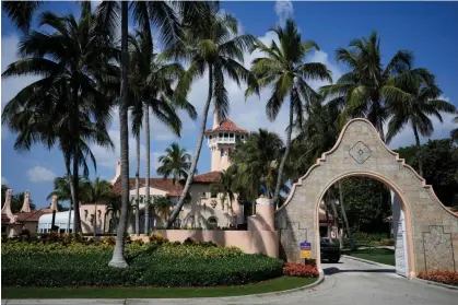  ?? Photograph: Rebecca Blackwell/AP ?? A security car blocks the driveway at the entrance to Donald Trump's Mar-a-Lago estate in Palm Beach, Florida, on 29 March 2023.