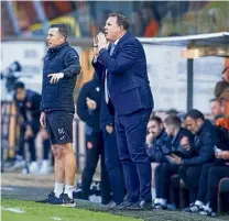  ?? ?? Top: Jordan White clips in his second goal of the day. Above left: Steven Fletcher gets a shot in. Above right: Ross County boss Malky Mackay.