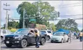  ?? FREDERIC J. BROWN/GETTY-AFP ?? Evacuees return to their homes Sunday in Pahoa, Hawaii, long enough to gather belongings and head back out.