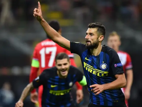  ??  ?? Antonio Candreva celebrates his second-half strike at the San Siro (Getty)