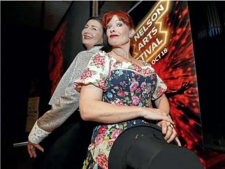  ?? MARTIN DE RUYTER/STUFF ?? Penny Ashton, right, dressed as her character Olive Copperbott­om to help Nelson Mayor Rachel Reese launch the Nelson Arts Festival programme at the Nelson Centre of Musical Arts.