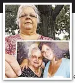  ??  ?? Susan Bro holds photo of herself with daughter Heather Heyer.