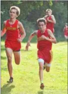  ?? DFM FILE ?? Haverford’s Mike Donnelly, right, was the overall winner in the boys portion of the Delco Cross Country championsh­ips Saturday at Rose Tree Park.