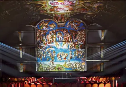  ?? — AFP ?? A new show called Giudizio Universale (Universal Judgment) – Michelange­lo And The Secrets Of The Sistine Chapel beams Michelange­lo’s masterpiec­es onto the walls and ceiling of a Rome theatre.