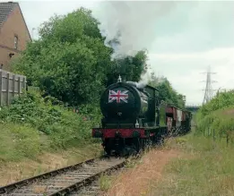  ??  ?? Left: The sole surviving J27, the North Eastern Locomotive Preservati­on Group's No. 65894, visited the North Tyneside Steam Railway for its 30th anniversar­y gala on July 9-11 (News, pages 28/29). Here it departs from Percy Main station, close to the site of Percy Main shed, where many fellow J27s were allocated. The Union Jack on the smokebox recreates the appearance of No. 65795 on the last day of steam at the shed on February 27, 1965. TOBY JENNINGS