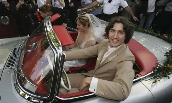  ?? BERNARD WEIL/TORONTO STAR FILE PHOTO ?? GQ magazine has named Justin Trudeau “the most stylish politician alive right now." He’s seen here with new bride Sophie Grégoire in the 2005 wedding photo that helped him earn the title.