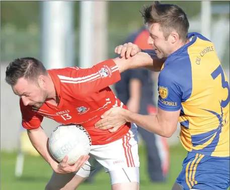  ??  ?? Alan Landy, Hunterstow­n is challenged by Fintan Clarke, Kilkerley during their Division 2 promotion play-off. Picture: Ken Finegan