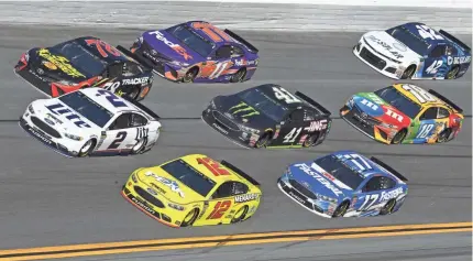  ?? MIKE DINOVO/USA TODAY SPORTS ?? Brad Keselowski (2) leads a pack of cars during the Advance Auto Parts Clash at Daytona Internatio­nal Speedway on Sunday.