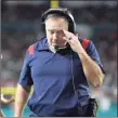  ?? Mark Brown / Getty Images ?? Patriots coach Bill Belichick walks the sidelines in the fourth quarter against the Dolphins on Sunday.