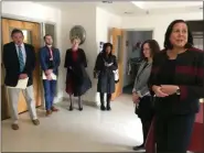  ?? EVAN BRANDT — MEDIANEWS GROUP ?? Congresswo­man Chrissy Houlahan, center, is joined by a group of officials as Kathryn Evans, right, executive director of Church Housing Corp., gives a tour of the Episcopal House Senior Housing facility.