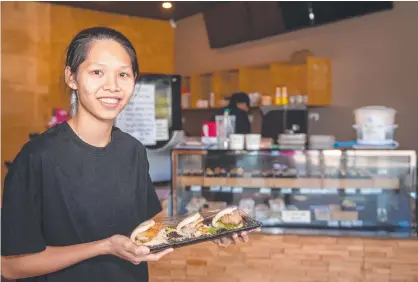  ??  ?? Lien Tuyen is the new owner of the Plainland sushi takeaway, which will change its name to Go N Sushi, pending approval. Photo: Ali Kuchel