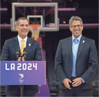  ?? KIRBY LEE, USA TODAY SPORTS ?? Los Angeles Mayor Eric Garcetti, left, wanted Casey Wasserman, right, to chair the Olympic bid.