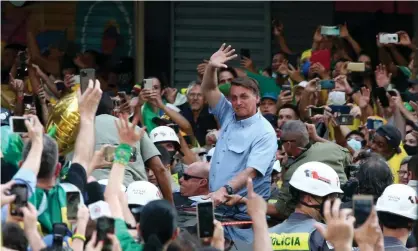  ?? Alexandre Schneider/Getty Images ?? President of Brazil Jair Bolsonaro waves to supporters during a demonstrat­ion on Brazil’s Independen­ce Day in São Paulo. Photograph: