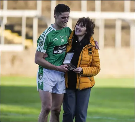  ??  ?? Former St Michaels/Foilmore footballer Éanna O’Connor is congratula­ted by his mother Bridie after receiving the Man of the Match award for his performanc­e with Moorefield from Kildare in the Leinster Club SFC quarter-final against Portlaoise at O’Moore Park in Portlaoise. Photo by Daire Brennan/Sportsfile