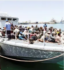  ?? Reuters/ File ?? Migrants being rescued by Libyan coast guards in Tripoli.