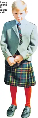  ??  ?? A very young JJ sports a kilt