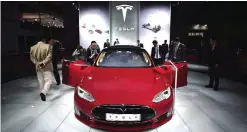  ??  ?? SHANGHAI: A Tesla Model S P85d car displayed at the 16th Shanghai Internatio­nal Automobile Industry Exhibition in Shanghai.