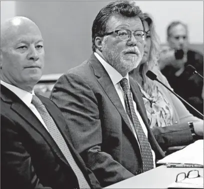  ?? STACEY WESCOTT/CHICAGO TRIBUNE ?? Hawthorne Racecourse President Tim Carey, left, and Gold Rush Gaming owner Rick Heidner speak Sept. 17 with the state Racing Board.