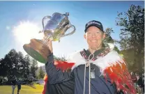  ?? PHOTO: BRETT PHIBBS/PHOTOSPORT ?? The spoils . . . Australian Brad Kennedy celebrates winning the 2020 New Zealand Open.