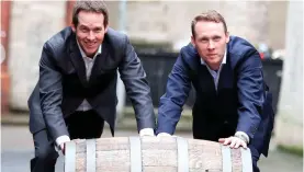  ??  ?? Jack Teeling, right, with brother Stephen outside the Teeling Whiskey distillery in Dublin, which was the city’s first in more than 125 years