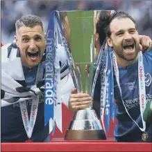  ?? Picture: Jordan Mansfield/Getty Images ?? TROPHY HOLDERS Pompey celebrate after winning the EFL Trophy in 2019.