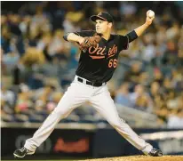  ?? GETTY ?? T.J. McFarland, shown in 2015, is back in the Orioles’ organizati­on, where he was from 2013-16. Since being released by Baltimore in 2017, he has pitched in the majors for Arizona, Oakland, St. Louis and the New York Mets.