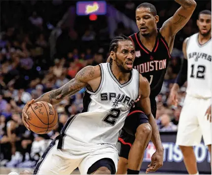  ?? THEARON W. HENDERSON / GETTY IMAGES ?? Kawhi Leonard, the San Antonio star small forward, reportedly wants out after a bizarre season in which he distanced himself from the team while playing just nine games because of a quad injury.