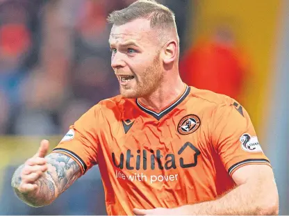  ?? Picture: SNS. ?? Dundee United defender Mark Connolly is enjoying the time with his wife and children.