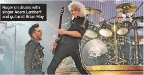  ?? ?? Roger on drums with singer Adam Lambert and guitarist Brian May