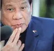  ?? MARK R. CRISTINO, EUROPEAN PRESSPHOTO AGENCY ?? President Rodrigo Duterte takes a hard line toward the “scourge of my nation.”