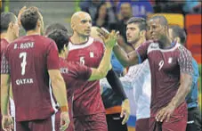  ?? AP PHOTO ?? Qatar men’s handball team had five players from the Balkans, two from Syria, one each from Cuba, Spain and France.