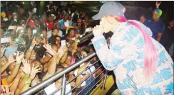  ?? (Pics: Mxolisi Dlamini) ?? Babes Wodumo captured engaging fans during her performanc­e at The Xchange Lounge and Shisanyama.