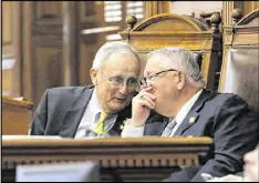  ?? BOB ANDRES / BANDRES@AJC.COM ?? Rules Committee Chairman John Meadows confers with House Speaker David Ralston during the 27th legislativ­e day of the 2017 Georgia General Assembly.