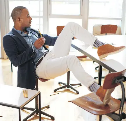  ??  ?? From fun socks to relaxed suiting separates, there are plenty of effortless ways for a man to update his wardrobe. This model wears a look from J.Crew.