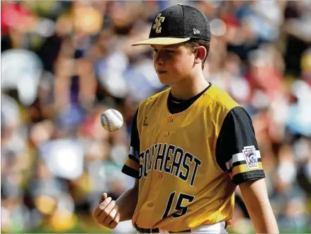  ?? ROB CARR / GETTY IMAGES ?? Peachtree City starting pitcher Connor Riggs-Soper struck out five Hawaii batters over 4⅔ innings in the U.S. Championsh­ip game on Saturday. He and the Peachtree City defense kept Hawaii off the scoreboard until the fourth inning of a 3-0 loss.