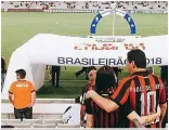  ?? ?? FOOTIE BOND Thays with dad at a game in S