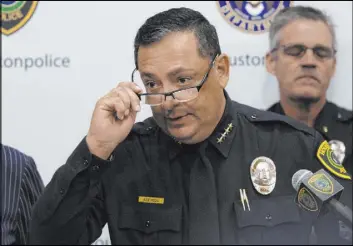  ?? Yi-Chin Lee The Associated Press ?? Houston Police Chief Art Acevedo speaks during a press conference Friday in Houston. A Houston police officer was hospitaliz­ed in stable condition after he was shot in a struggle with a suspect, the city’s police chief said Friday.