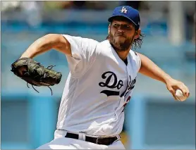  ?? ALEX GALLARDO / THE ASSOCIATED PRESS ?? Dodgers starting pitcher Clayton Kershaw throws during the first inning July 23 against the Braves in Los Angeles.