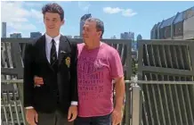  ??  ?? PROUD AS PUNCH: Tom Matthews with his dad Scott at his Year 12 graduation this year. PHOTO: CONTRIBUTE­D