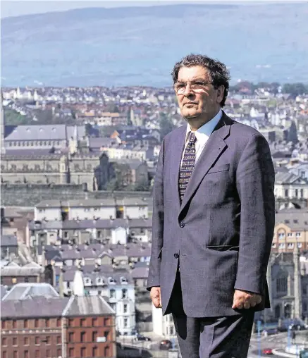  ??  ?? Homeplace: John Hume in his native Derry, where he enjoyed huge popularity; right, celebratin­g with his beloved Derry City FC.