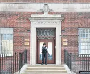  ??  ?? A police officer stands outside the Lindo Wing of St Mary’s Hospital in Paddington, London yesterday where the Duchess of Cambridge entered into labour.