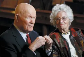  ?? PAUL VERNON — THE ASSOCIATED PRESS FILE ?? Former astronaut and U.S. Sen. John Glenn, D-Ohio, left, answers questions with his wife Annie Glenn during an interview with The Associated Press at the Ohio Statehouse in Columbus in 2015. Glenn, the widow of John Glenn and a communicat­ion disorders advocate, died Tuesday, May 19, of COVID-19 complicati­ons at a nursing home near St. Paul, Minn., at age 100.